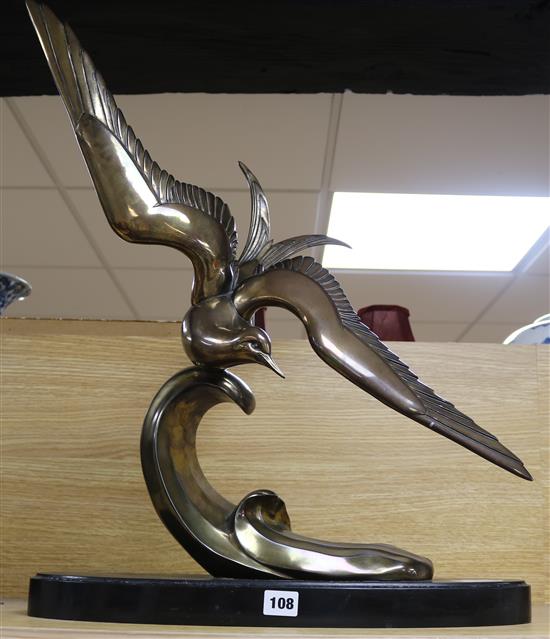 A French Art Deco bronze model of a seagull, on black marble plinth H.60cm.